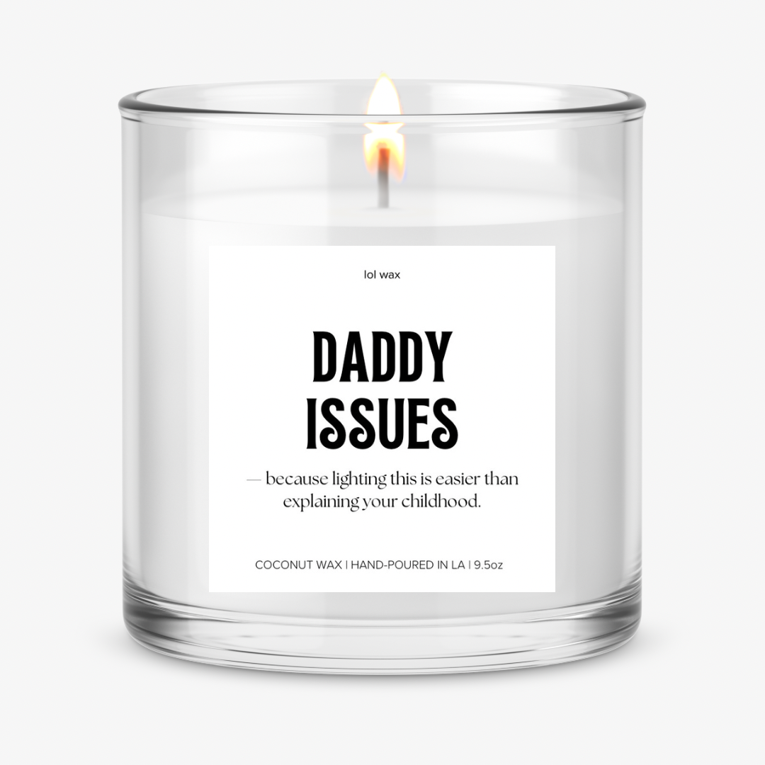 lol wax 'Daddy Issues' candle with a witty quote on a white label, clear glass container, and hand-poured coconut wax visible.