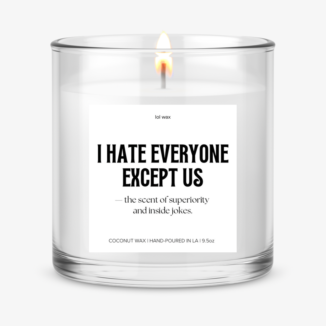 Candle with 'I Hate Everyone Except Us' label by lol wax, showcasing a clean design with black text on white background.